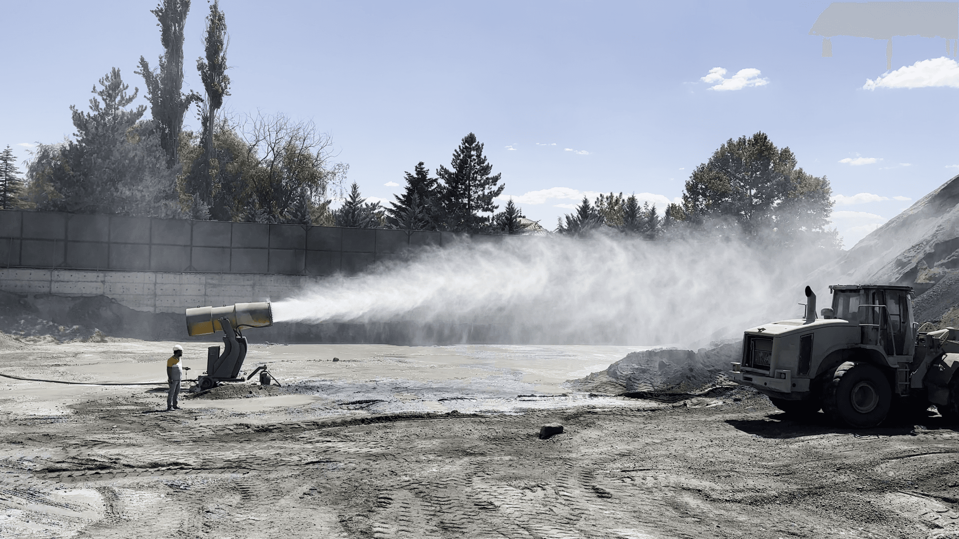 A mobile, trailer-mounted fog cannon unit at a mining site.