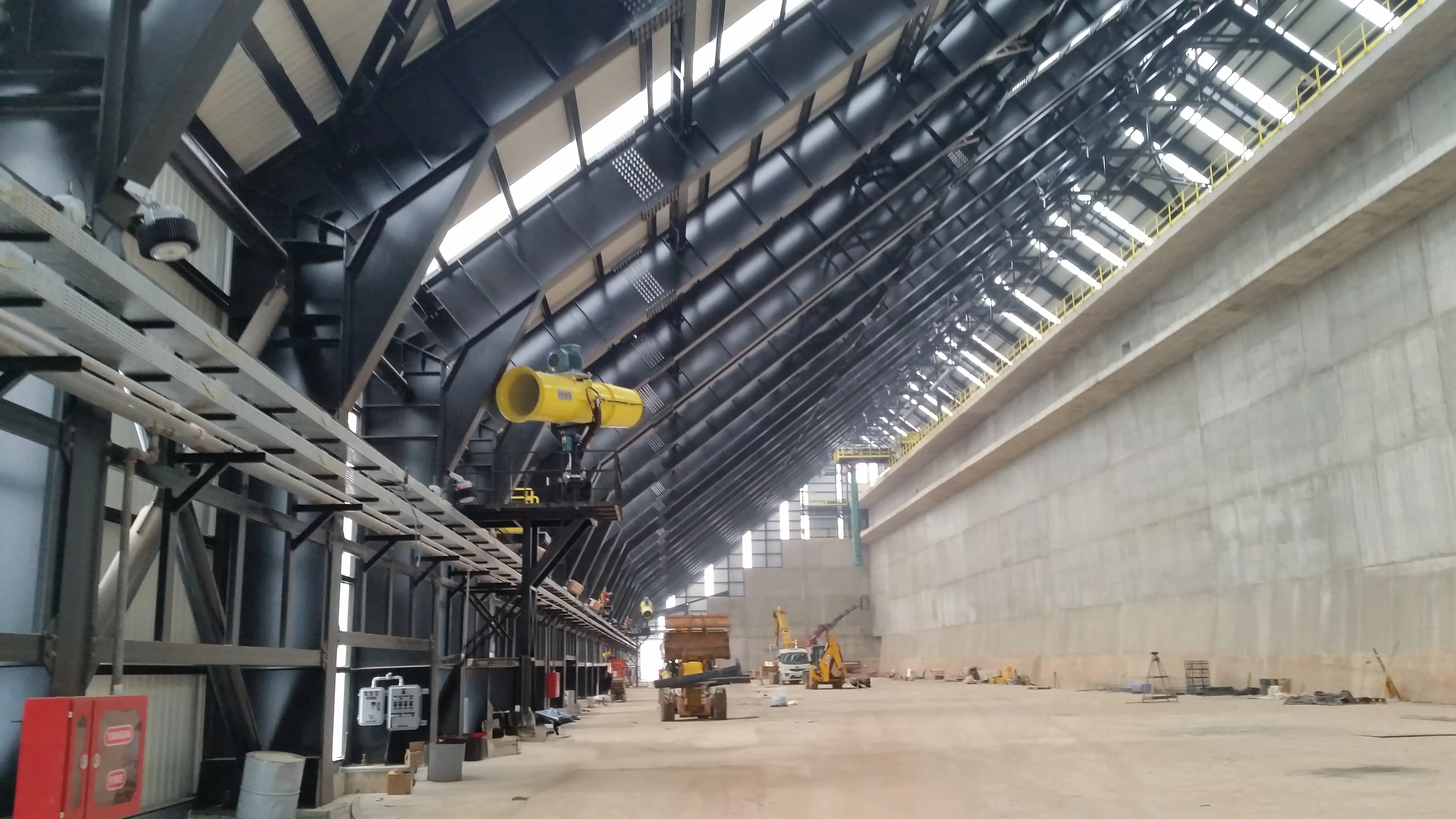 Oil Refinery Stockyard Dust Control Fog cannon dust control system operating at an oil refinery stockyard