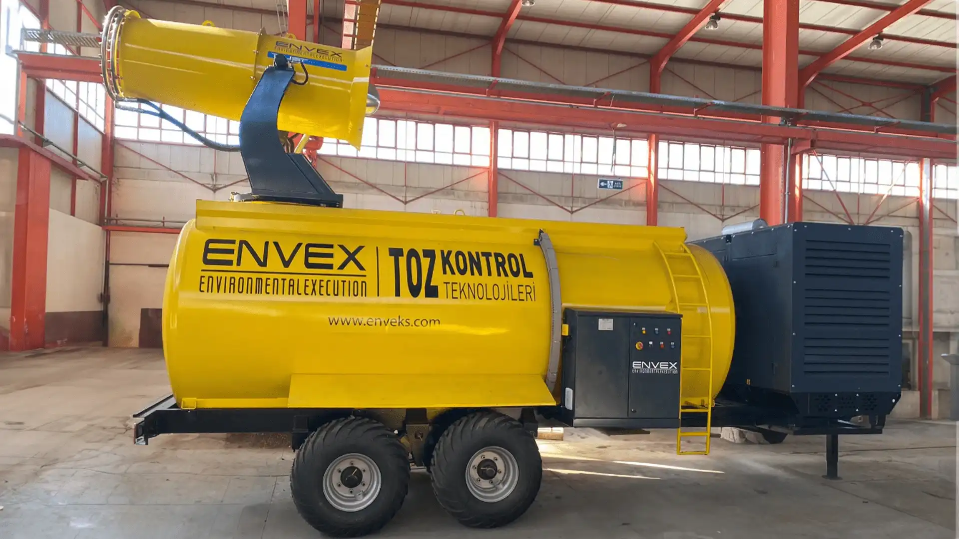 Trailer Mounted Fog Cannon with Water Tank and Generator A mobile, trailer-mounted fog cannon unit with its own generator and water tank.